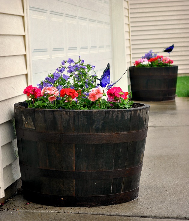 barrel planters  DIY: Turn Old Things Into Beautiful Flower Pots and Planters