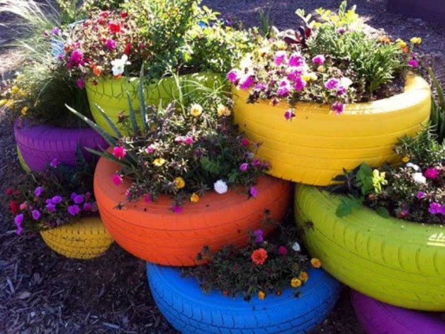 old tires flower pots 634x475 DIY: Turn Old Things Into Beautiful Flower Pots and Planters