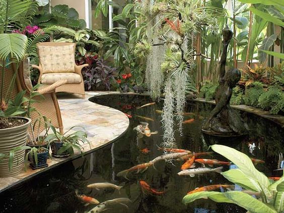 15 wonderful backyards with koi ponds you need to see for Koi pond greenhouse
