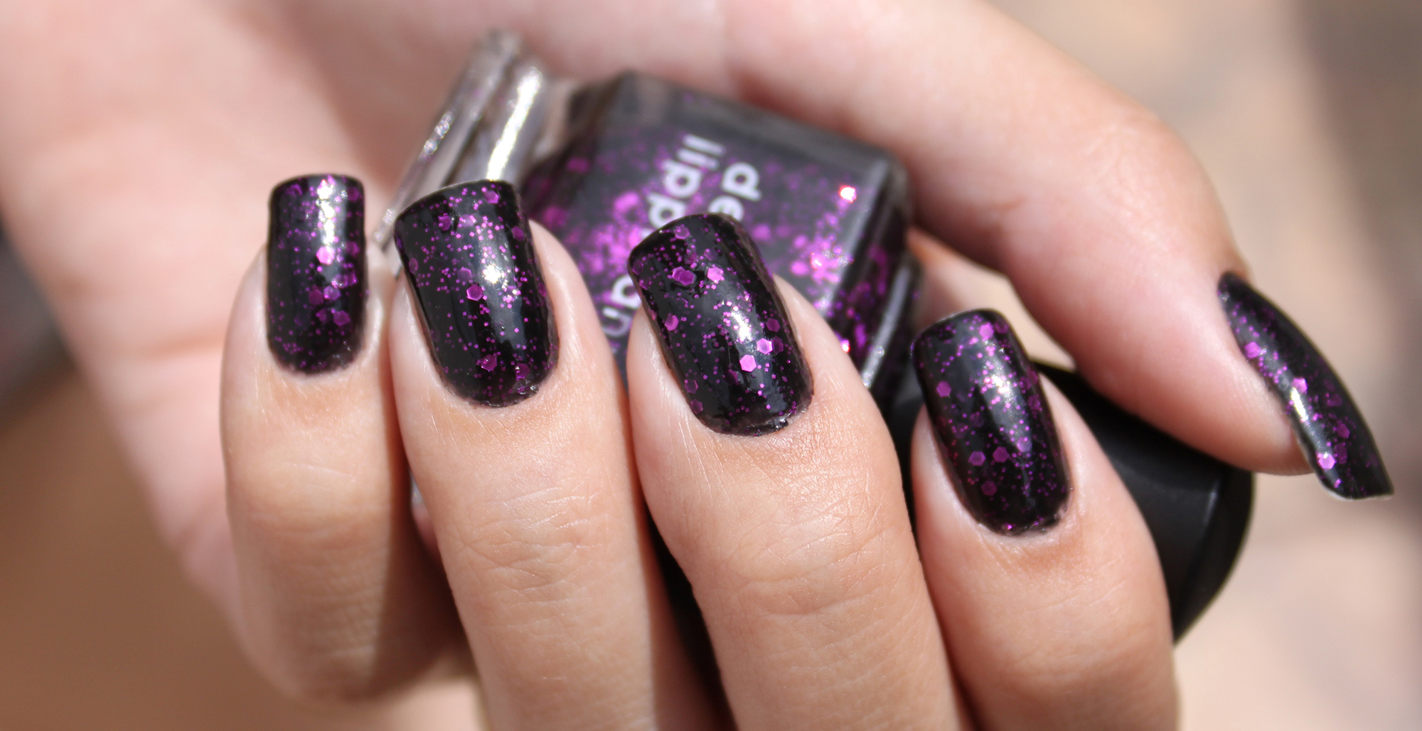 1. Black and Purple Ombre Nail Design - wide 8